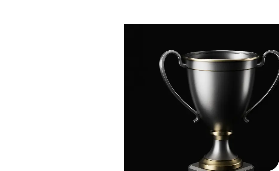 Silver trophy cup with gold accents on a black background.